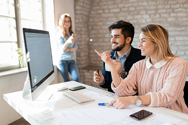 creative coworkers working in office FK839WL